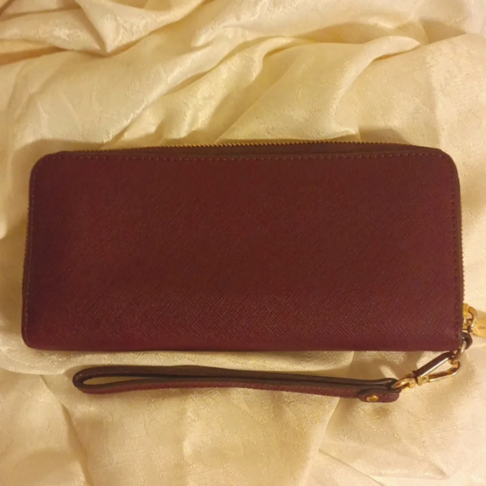 Michael Kors large Saffiano burgundy color leather accordion wallet/ wri…